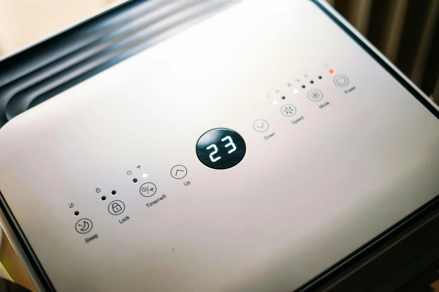 Modern dehumidifier control panel showing humidity setting