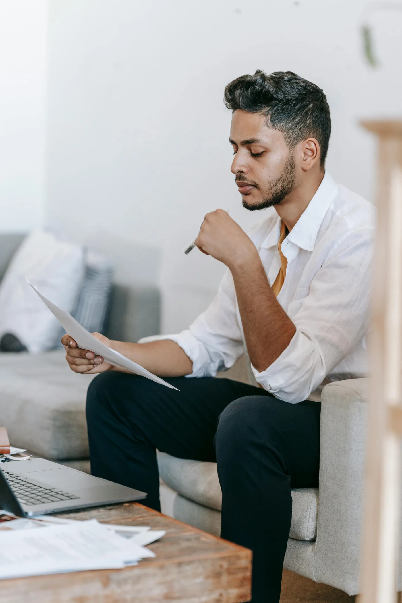 Man reviewing documents and budget details