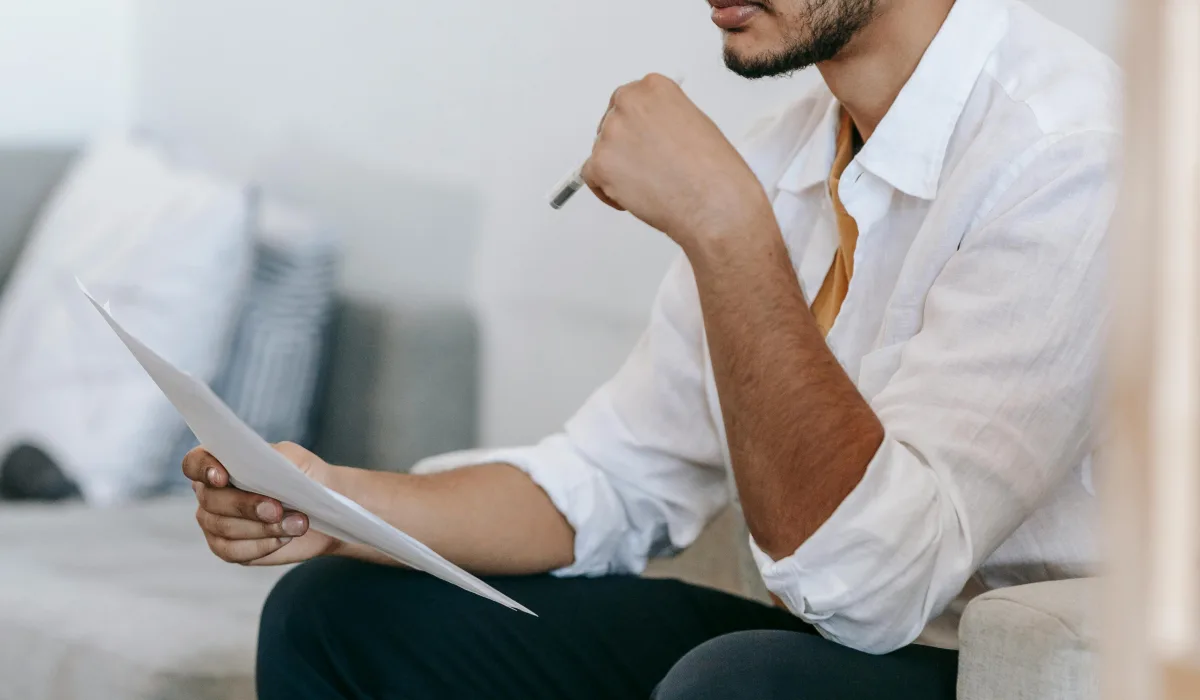Man reviewing documents and budget details